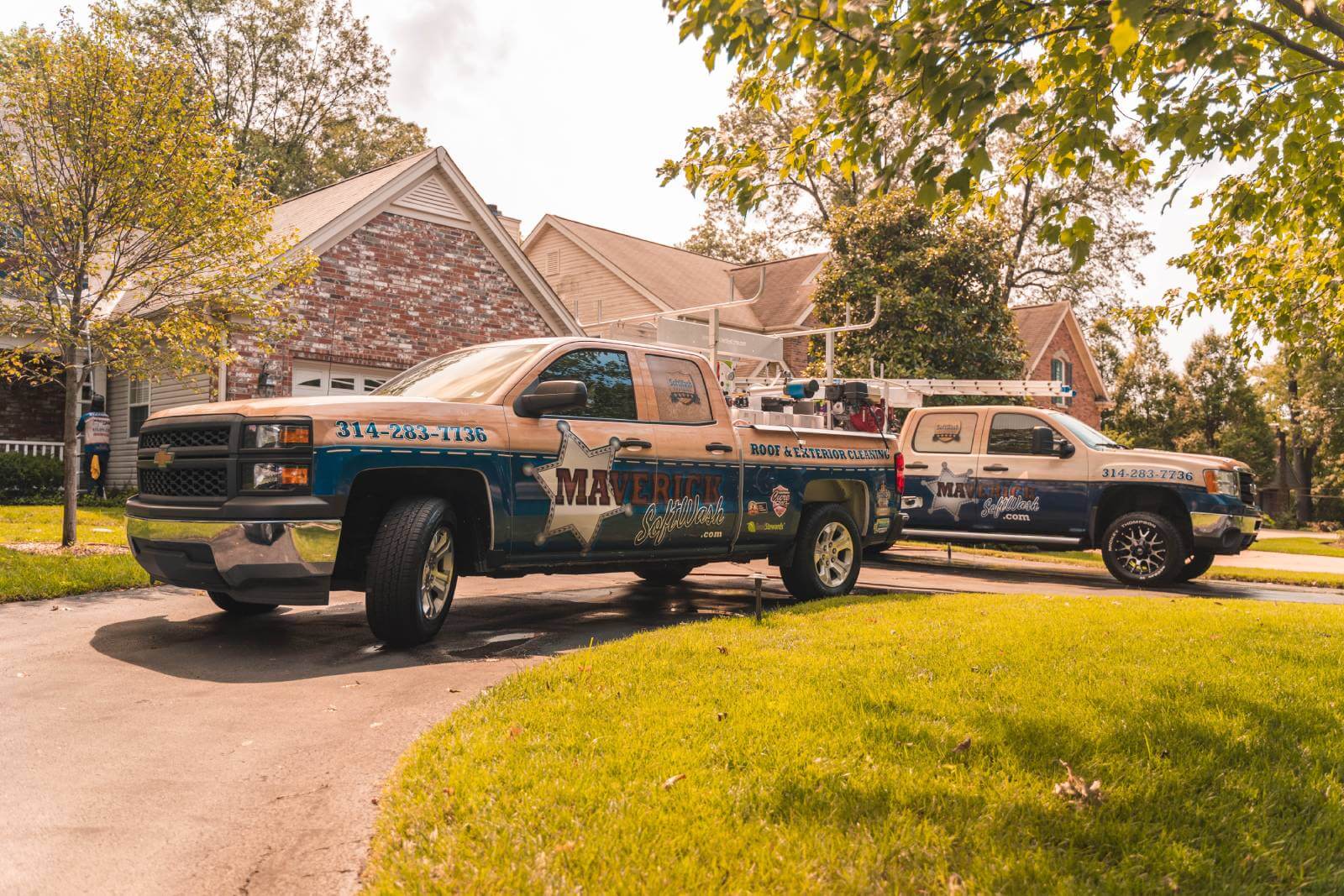 Maverick SoftWash trucks on a residential job